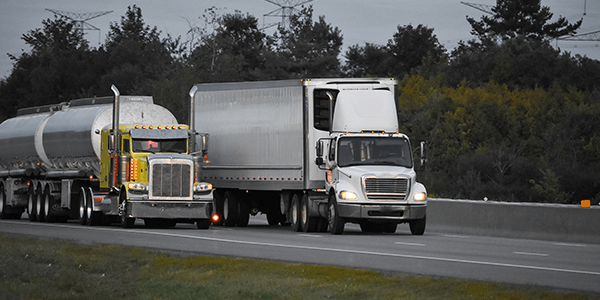 trucks on the road hauling cargo